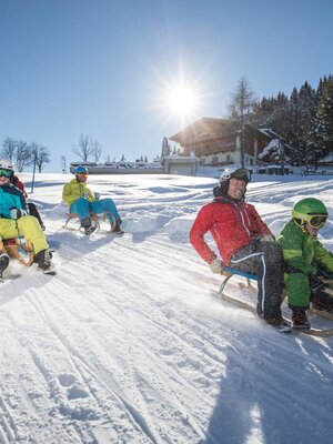 Ski Juwel Alpbachtal Wildschönau Rodeln Familie.jpg | © Wildschönau Tourismus